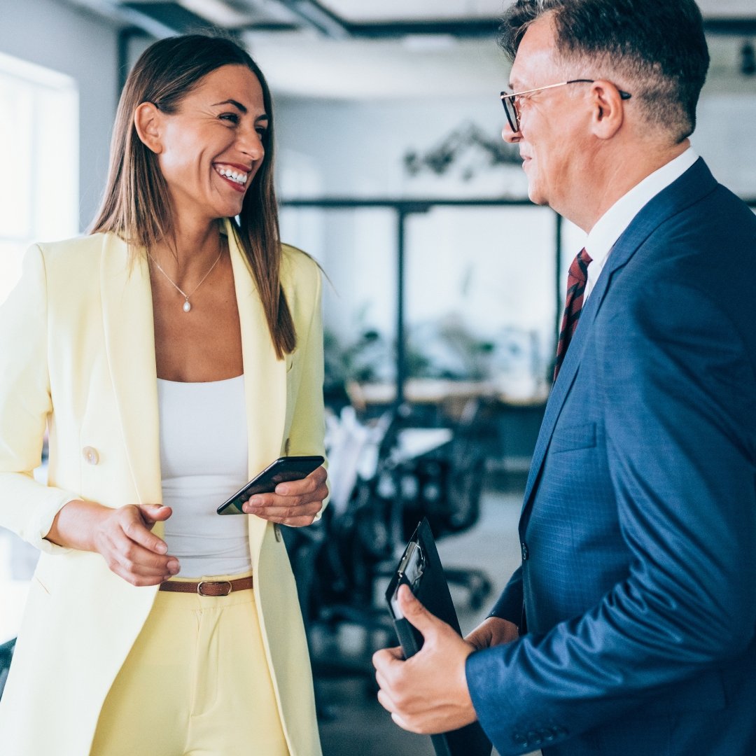 Executives having a conversation at work